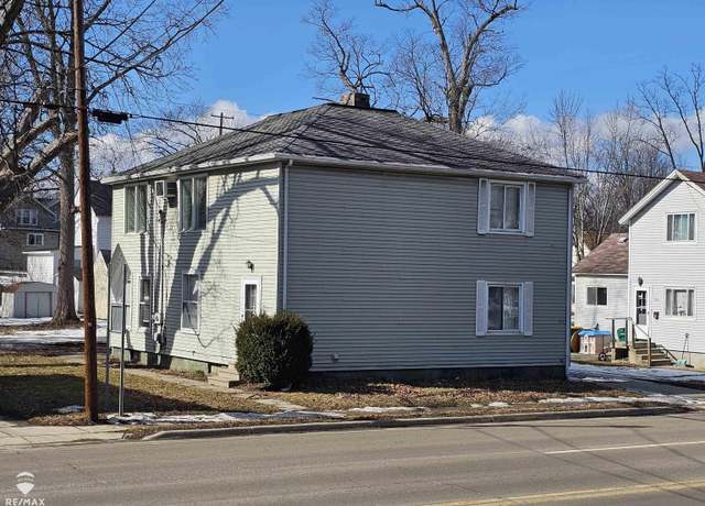 Property at 215 N Shiawassee St, Owosso, MI 48867, 4 beds, 2 baths
