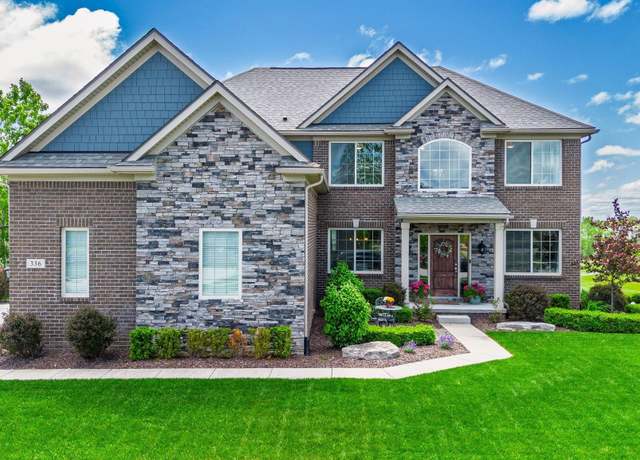 Property at 336 Golfside Dr, Oxford, MI 48371, 4 beds, 2.5 baths