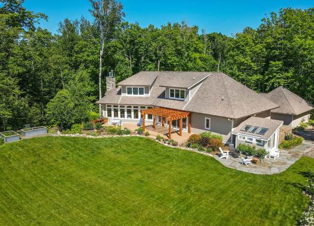Property at 4201 N High Bluffs Dr, Leland, MI 49654, 4 beds, 5.5 baths