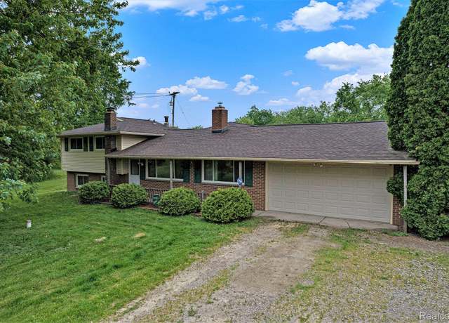 Property at 7340 Hartland Rd, Fenton, MI 48430, 4 beds, 2 baths