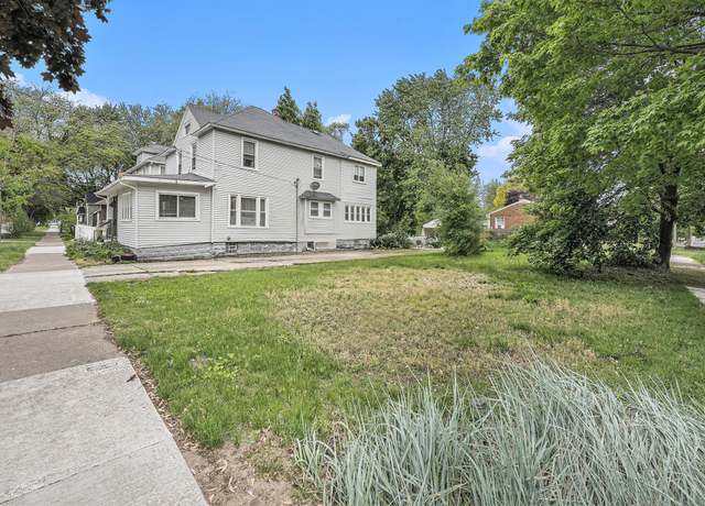 Property at 1107 11th St NW, Grand Rapids, MI 49504, 4 beds, 2 baths