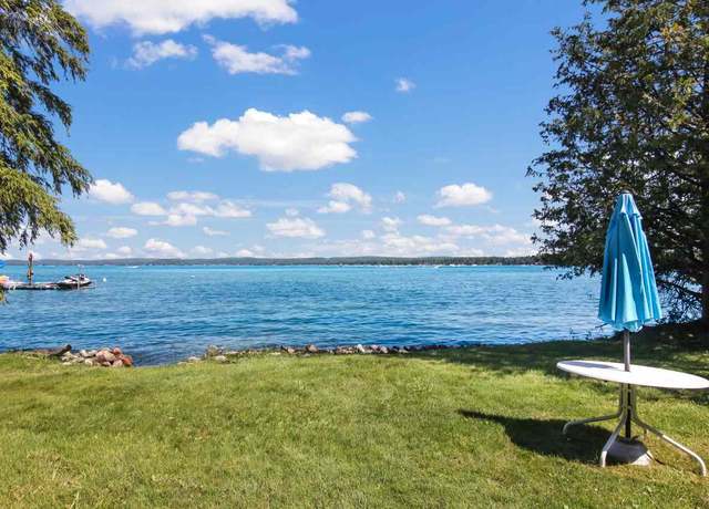 Property at 12147 SW Torch Lake Dr, Rapid City, MI 49676, 4 beds, 1 bath