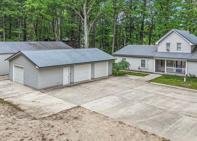 Property at 6836 NW Aarwood Trl, Rapid City, MI 49676, 4 beds, 2.5 baths