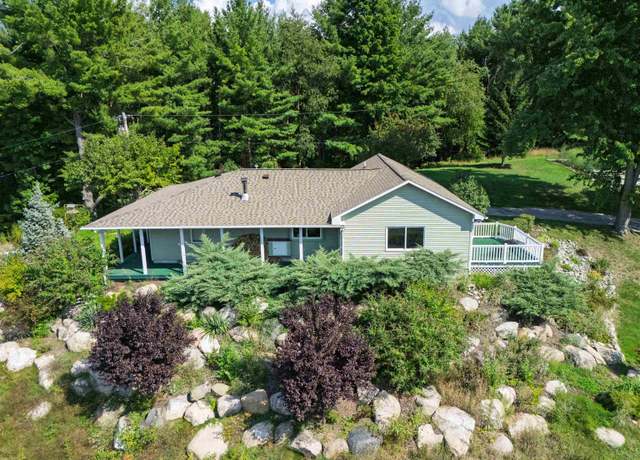 Property at 10311 SE Torch Lake Dr, Helena Township, MI 49612, 5 beds, 5 baths