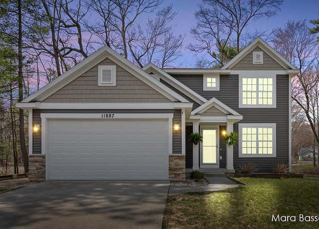 Property at 11887 Wabasis Ave NE, Rockford, MI 49341, 5 beds, 3.5 baths