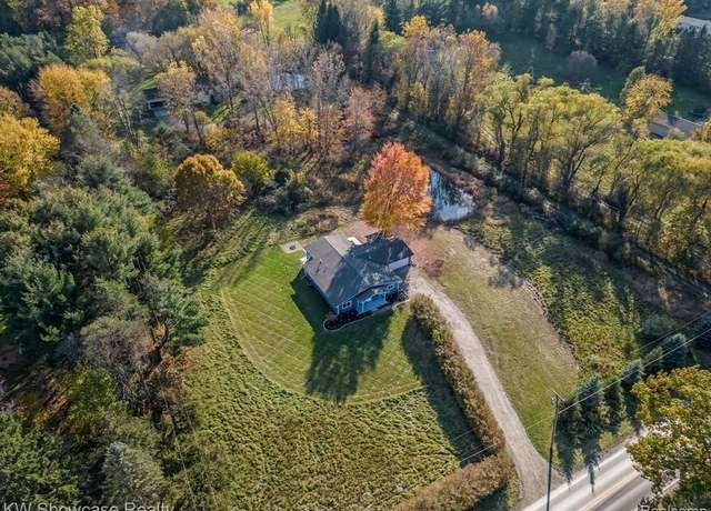 Property at 5461 W Coon Lake Rd, Howell, MI 48843, 4 beds, 3 baths