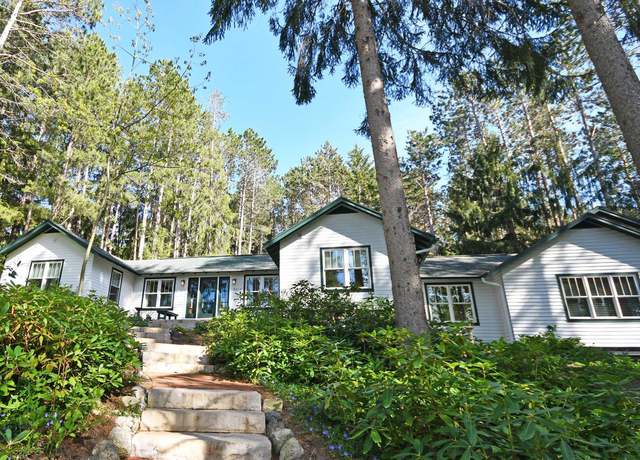 Property at 9017 S Dunns Farm Rd, Maple City, MI 49664, 4 beds, 3 baths