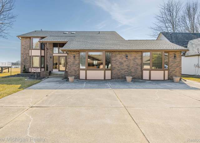 Property at 4427 Pointe Tremble Rd, Algonac, MI 48001, 6 beds, 3 baths