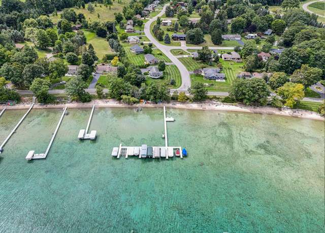 Property at 8122 Bay East Ct, Peninsula Township, MI 49686, 4 beds, 2 baths