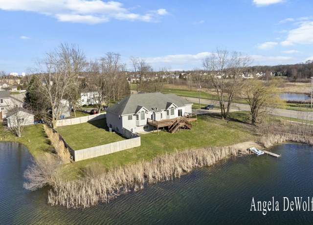 Property at 4087 Baldwin St, Hudsonville, MI 49426, 4 beds, 3 baths