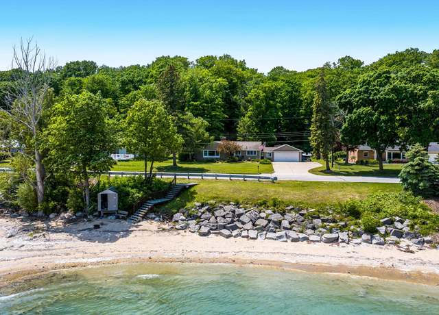 Property at 11182 S West Bay Shore Dr, Traverse City, MI 49684, 5 beds, 3 baths
