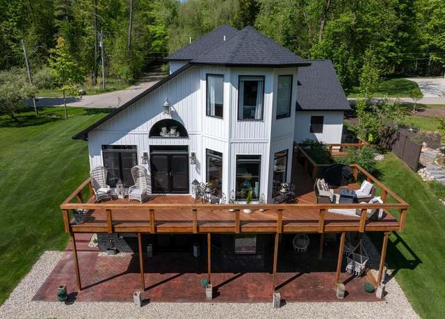 Property at 1465 Woodlawn Ave, Clare, MI 48617, 3 beds, 3.5 baths