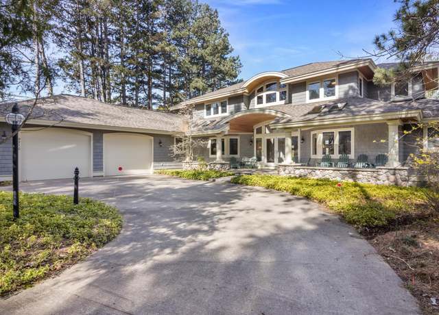 Property at 9710 Cherry Ave, Rapid City, MI 49676, 5 beds, 4.5 baths