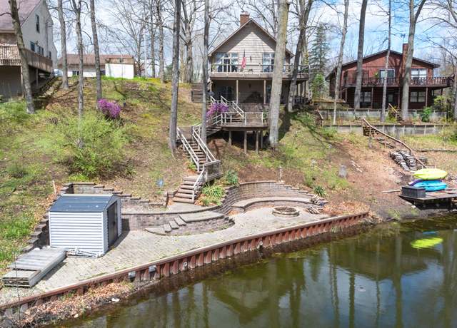 Property at 10941 Woodbrook Dr, Cement City, MI 49233, 4 beds, 3 baths