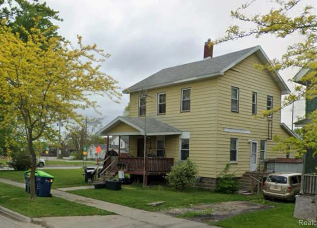 Property at 418 Adams St, Bay City, MI 48708, 4 beds, 3 baths