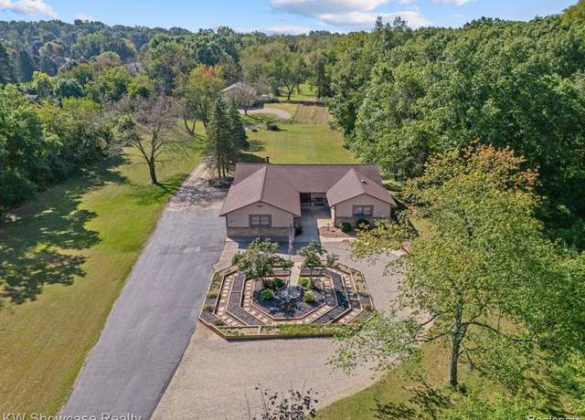 Property at 766 White House Dr, Highland, MI 48356, 4 beds, 4.5 baths