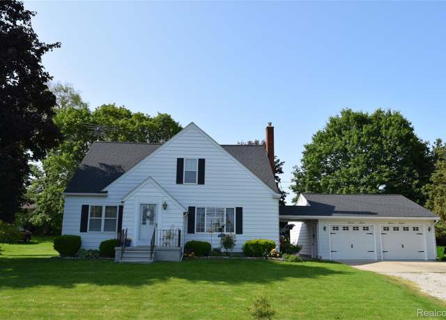 Property at 7448 Miller Rd, Swartz Creek, MI 48473, 5 beds, 2 baths