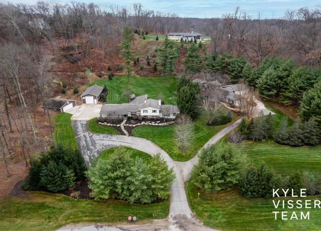 Property at 589 Grand River Dr NE, Ada, MI 49301, 4 beds, 4.5 baths