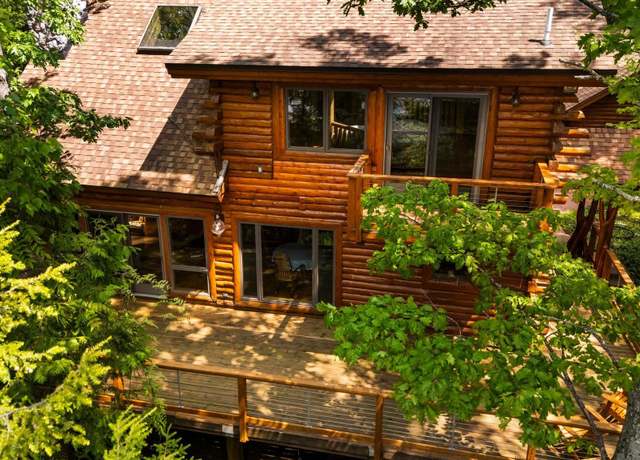 Property at 10037 Mud Lake Rd, Interlochen, MI 49643, 4 beds, 3.5 baths