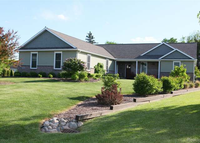 Property at 1041 Lancaster St, Lapeer, MI 48446, 3 beds, 3.5 baths