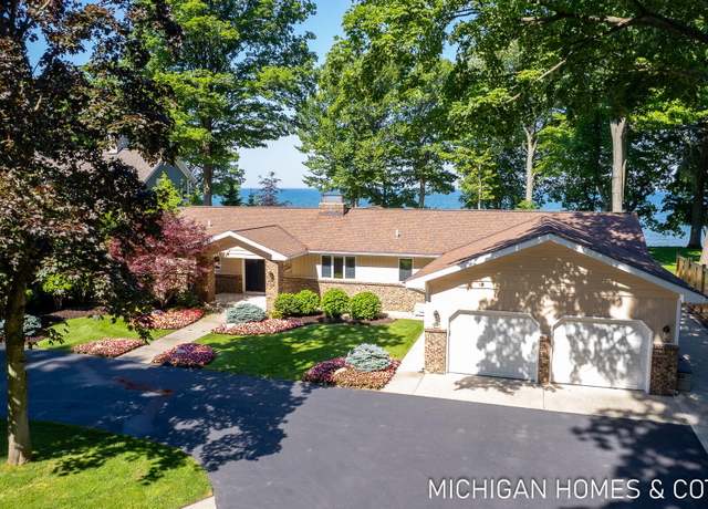 Property at 3065 N Lakeshore Dr, Holland, MI 49424, 2 beds, 3 baths