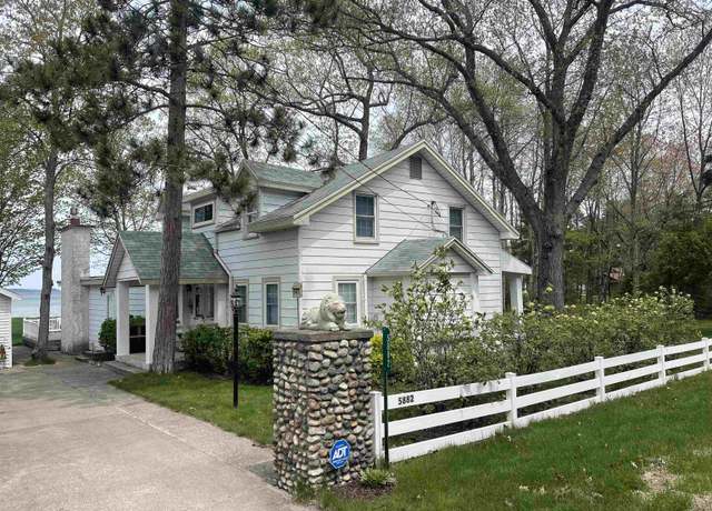 Property at 5882 Crystal Beach Rd, Rapid City, MI 49676, 7 beds, 2 baths