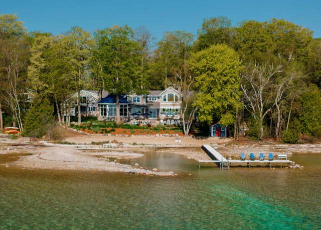 Property at 91 S Nanagosa Trl, Suttons Bay, MI 49682, 7 beds, 5 baths