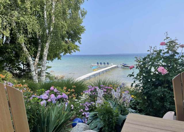 Property at 91 S Nanagosa Trl, Suttons Bay, MI 49682, 7 beds, 5 baths