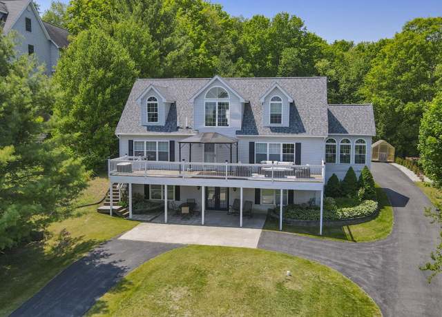 Property at 9821 Elk Lake Trl, Williamsburg, MI 49690, 6 beds, 4 baths