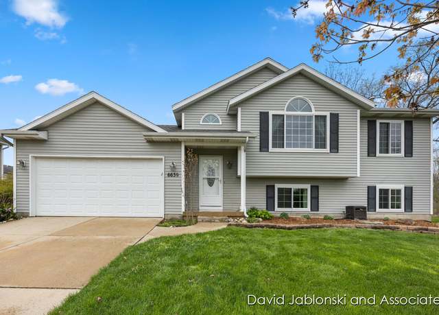 Property at 6639 Sawgrass Dr SE, Grand Rapids, MI 49508, 4 beds, 2 baths