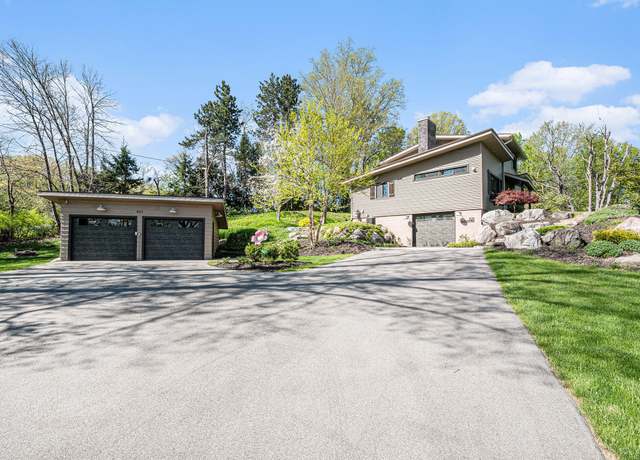 Property at 821 Grand River Dr NE, Ada, MI 49301, 4 beds, 2.5 baths