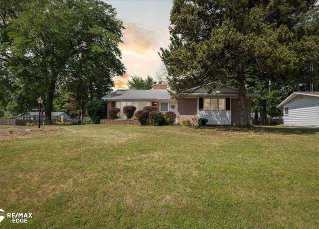 Property at 2209 Blackthorn Dr, Burton, MI 48509, 4 beds, 2 baths