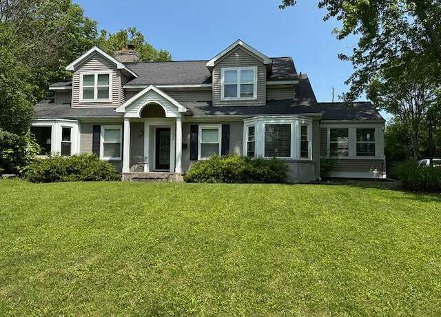 Property at 1428 Woodlawn Ave SE, East Grand Rapids, MI 49506, 4 beds, 3.5 baths