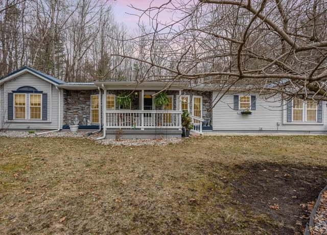Property at 804 W Sand Beach Dr, Sanford, MI 48657, 3 beds, 2 baths