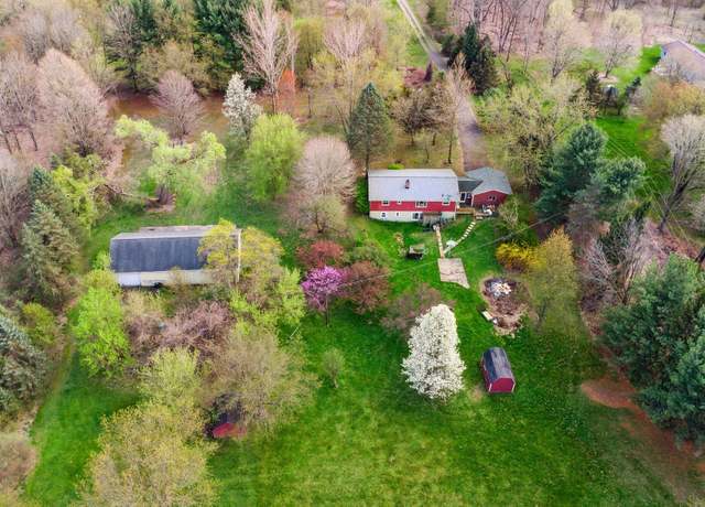 Property at 7107 E Highland Rd, Howell, MI 48843, 4 beds, 2 baths