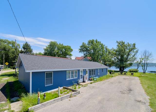Property at 5015 Main St, Onekama, MI 49675, 5 beds, 3 baths