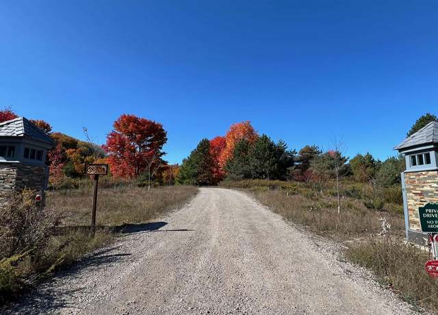 Property at 3970 NW Torch Lake Dr, Kewadin, MI 49648, 4 beds, 5.5 baths