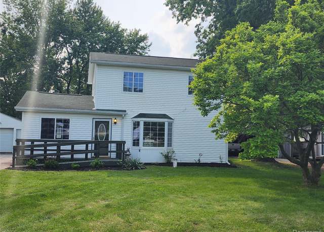 Property at 2134 Cherrywood Dr, Burton, MI 48519, 4 beds, 2 baths