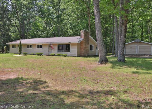 Property at 10475 W Higgins Lake Dr, Lyon Township, MI 48653, 4 beds, 3 baths