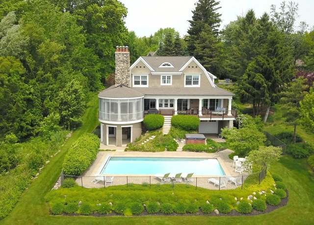 Property at 2634 Reeds Lake Ct SE, East Grand Rapids, MI 49506, 5 beds, 4.5 baths