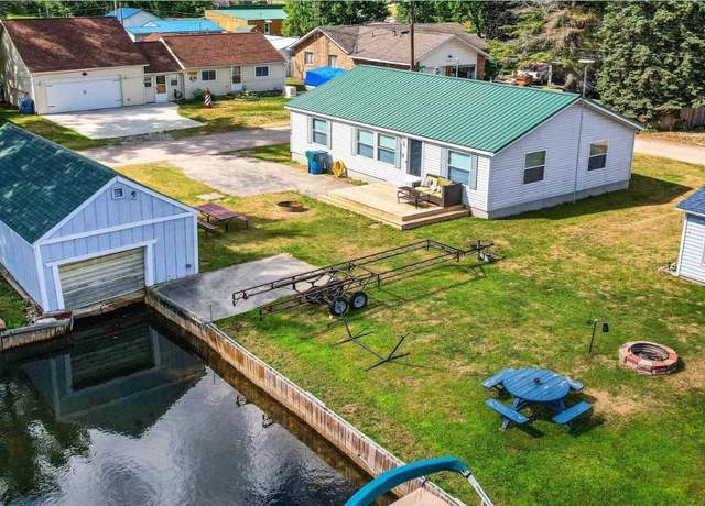 Property at 100 Island Dr, Houghton Lake, MI 48629, 3 beds, 2 baths