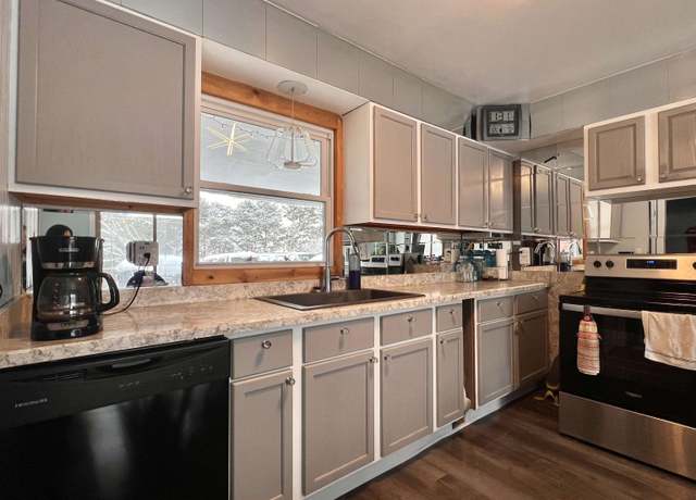 Property at 3935 E Long Lake Rd, Long Lake Township, MI 49685, 6 beds, 3 baths