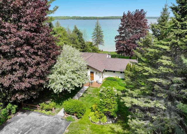 Property at 9882 Elk Lake Trl, Williamsburg, MI 49690, 3 beds, 2 baths