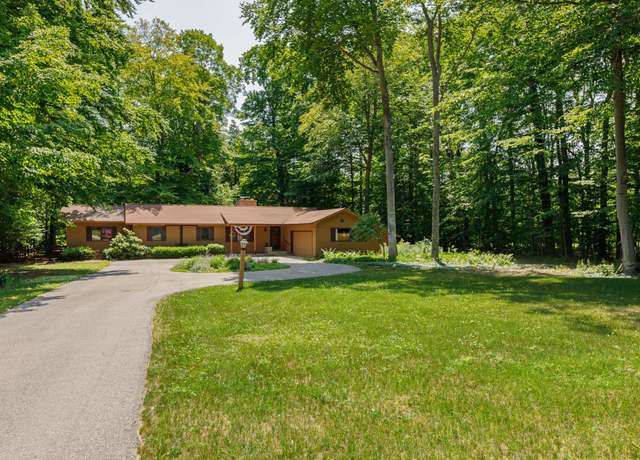Property at 3862 N Trillium Dr, Leland, MI 49654, 3 beds, 2 baths