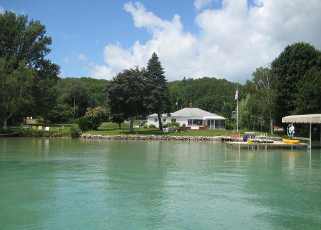 Property at 12225 SW Torch Lake Drive,sw Dr, Rapid City, MI 49676, 3 beds, 2 baths