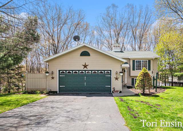 Property at 11144 Crawford Lake Trl, Cedar Springs, MI 49319, 4 beds, 2 baths