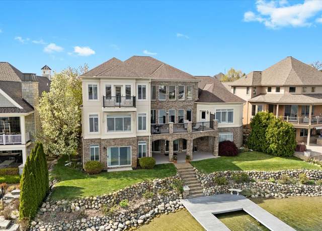 Property at 8393 Boulder Shores Dr, South Lyon, MI 48178, 5 beds, 5.5 baths
