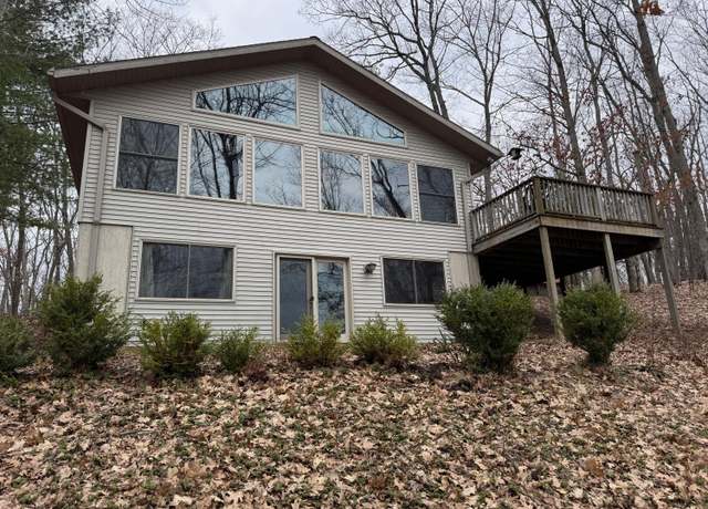 Property at 6876 W Twin Lake Dr, Irons, MI 49644, 3 beds, 3 baths