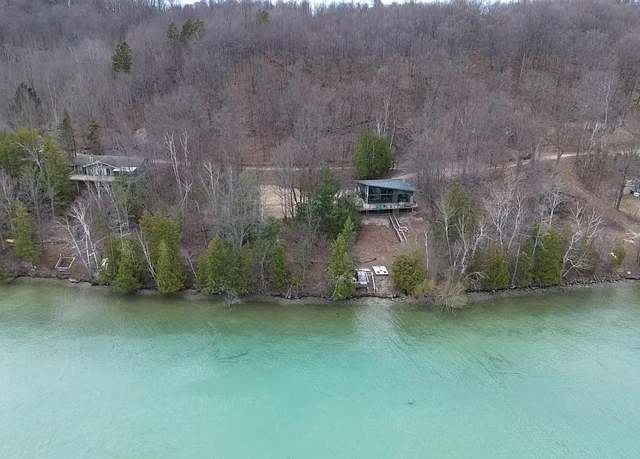 Property at 7681 NW Torch Lake Dr, Kewadin, MI 49648