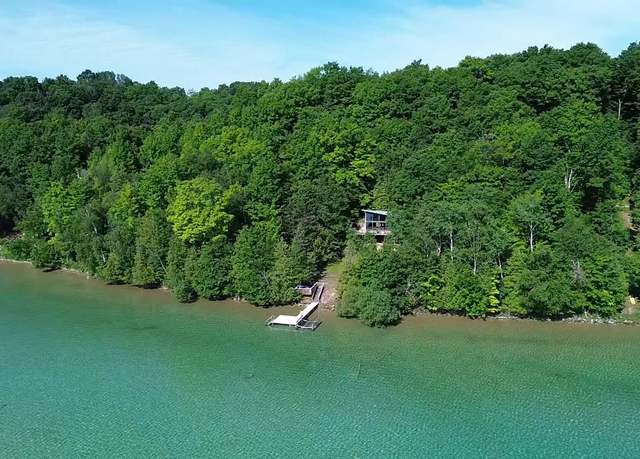 Property at 7681 NW Torch Lake Dr, Kewadin, MI 49648
